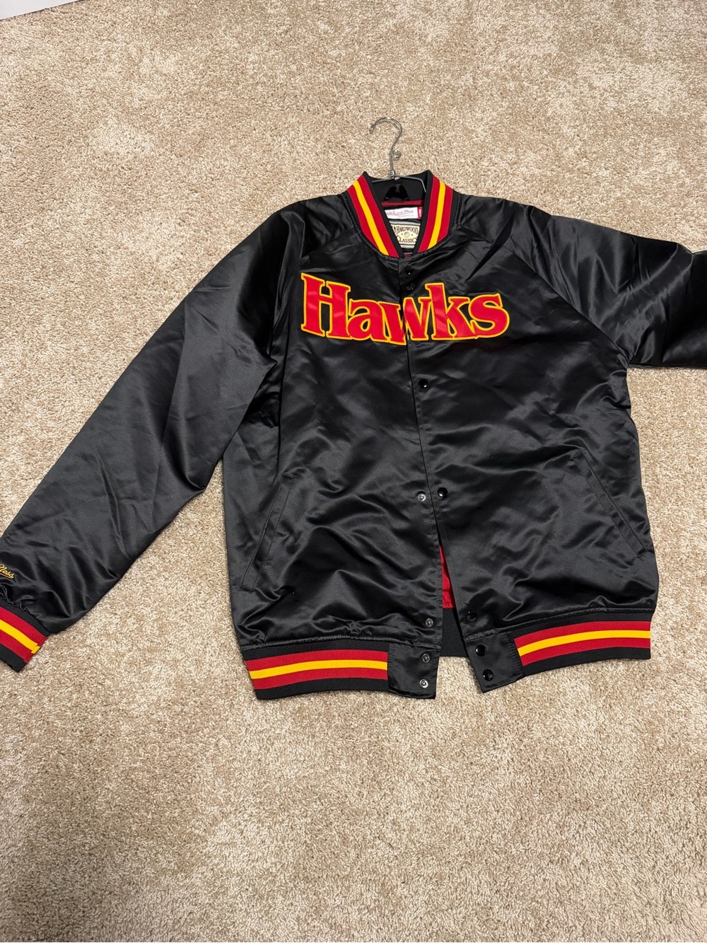 Mitchell & Ness Black Satin Hawks Bomber Jacket with Red & Yellow Trim